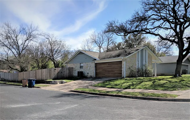 a house view with a outdoor space