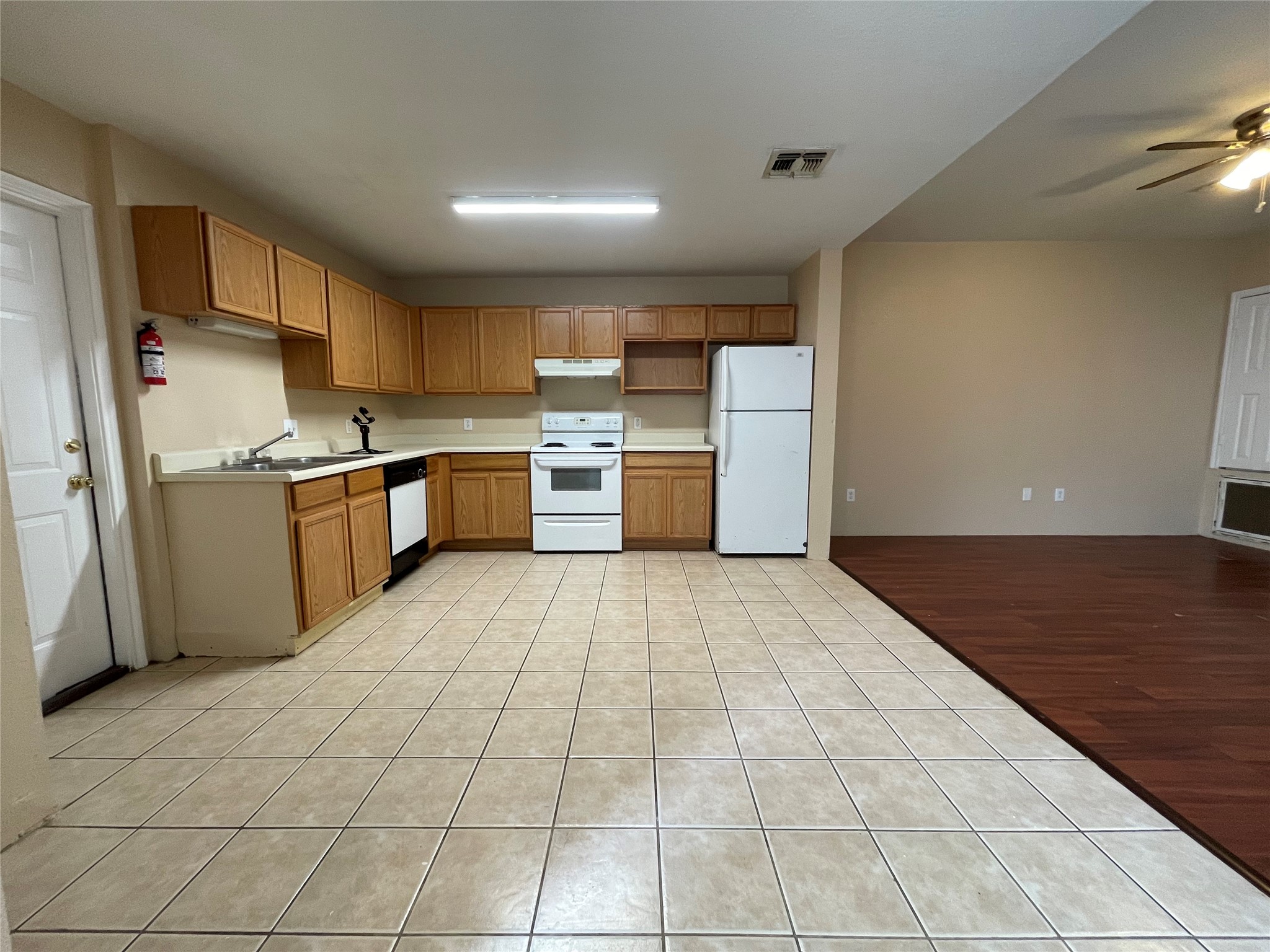 11241 Terra Loop Road San Antonio, TX 78233 - Photo 1 of 5 Functional kitchen with ample cabinetry and essential appliances.
