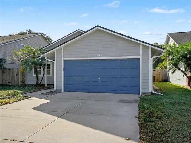 a view of a house with a garden