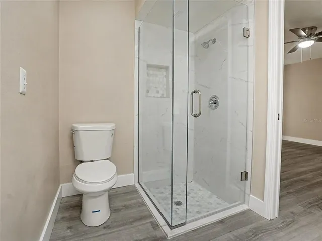 a bathroom with a toilet sink and bathtub