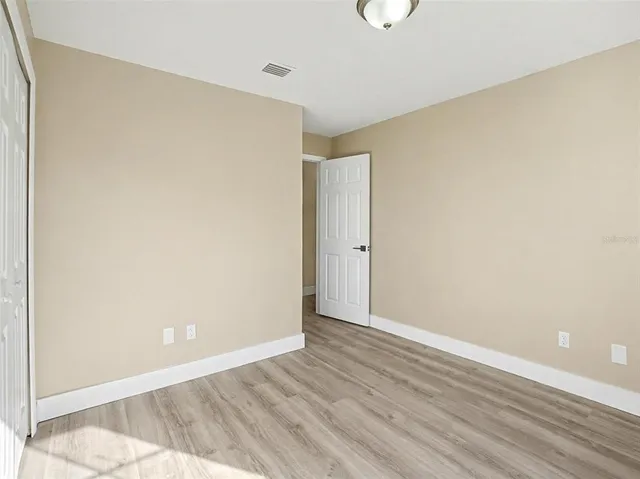 a house view with a backyard space