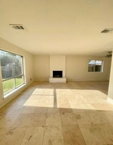 a view of empty room with a window
