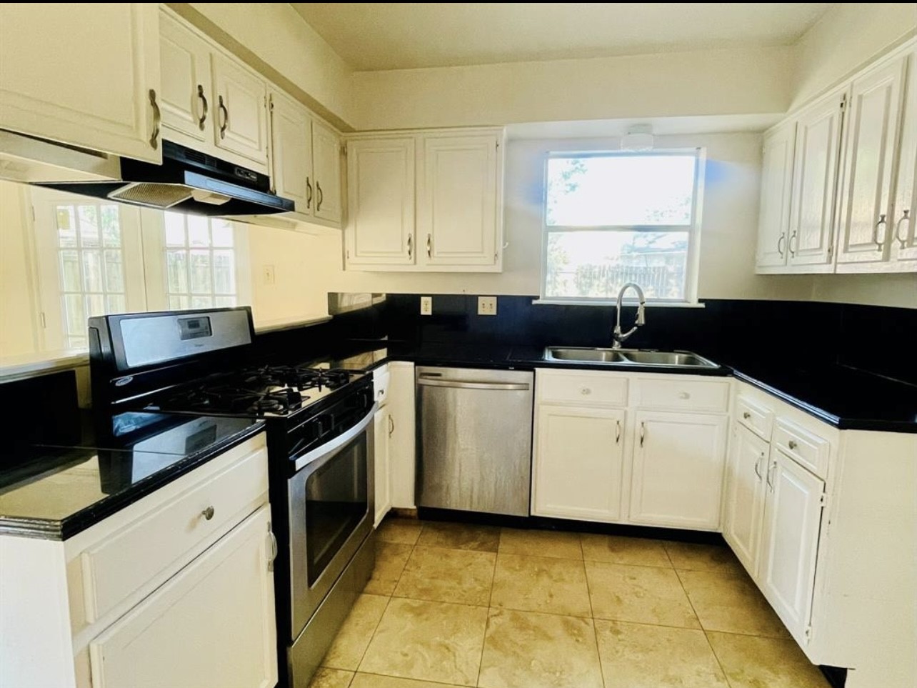 24022 Spring Fork Drive Spring, TX 77373 - Photo 17 of 23 a kitchen with a sink and cabinets