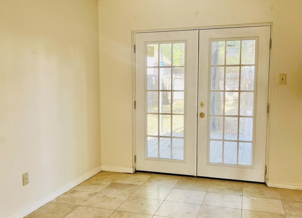 24022 Spring Fork Drive Spring, TX 77373 - Photo 19 of 23 a view of an empty room with a window
