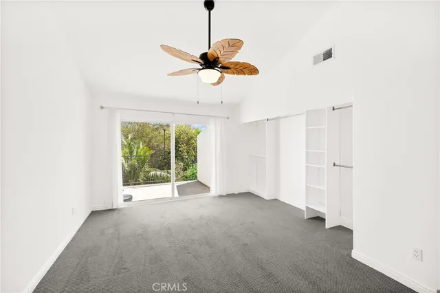 a view of a room that has a window