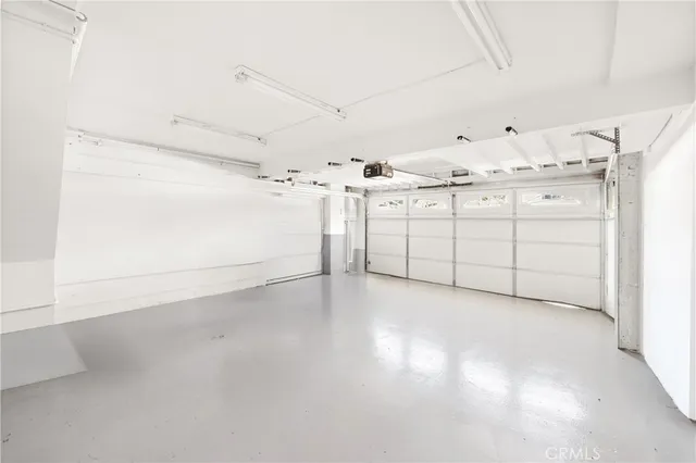 an aerial view of residential house with outdoor space and parking