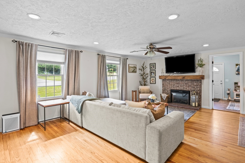 40 Crest Road Monson, MA 01057 - Photo 4 of 34 a living room with furniture flat screen tv and a fireplace