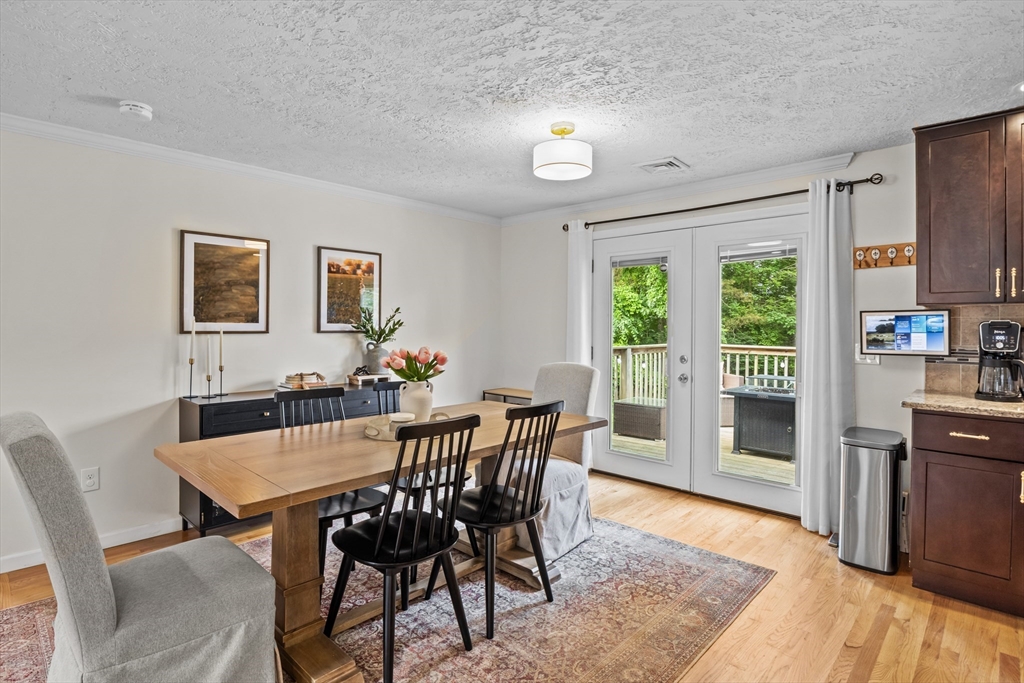 40 Crest Road Monson, MA 01057 - Photo 8 of 34 a view of a dining room with furniture window and wooden floor