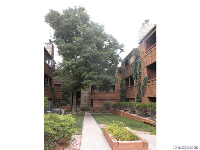 4691 South Decatur Street, Unit 115 Englewood, CO 80110 - Photo 1 of 1 a front view of a house with a yard