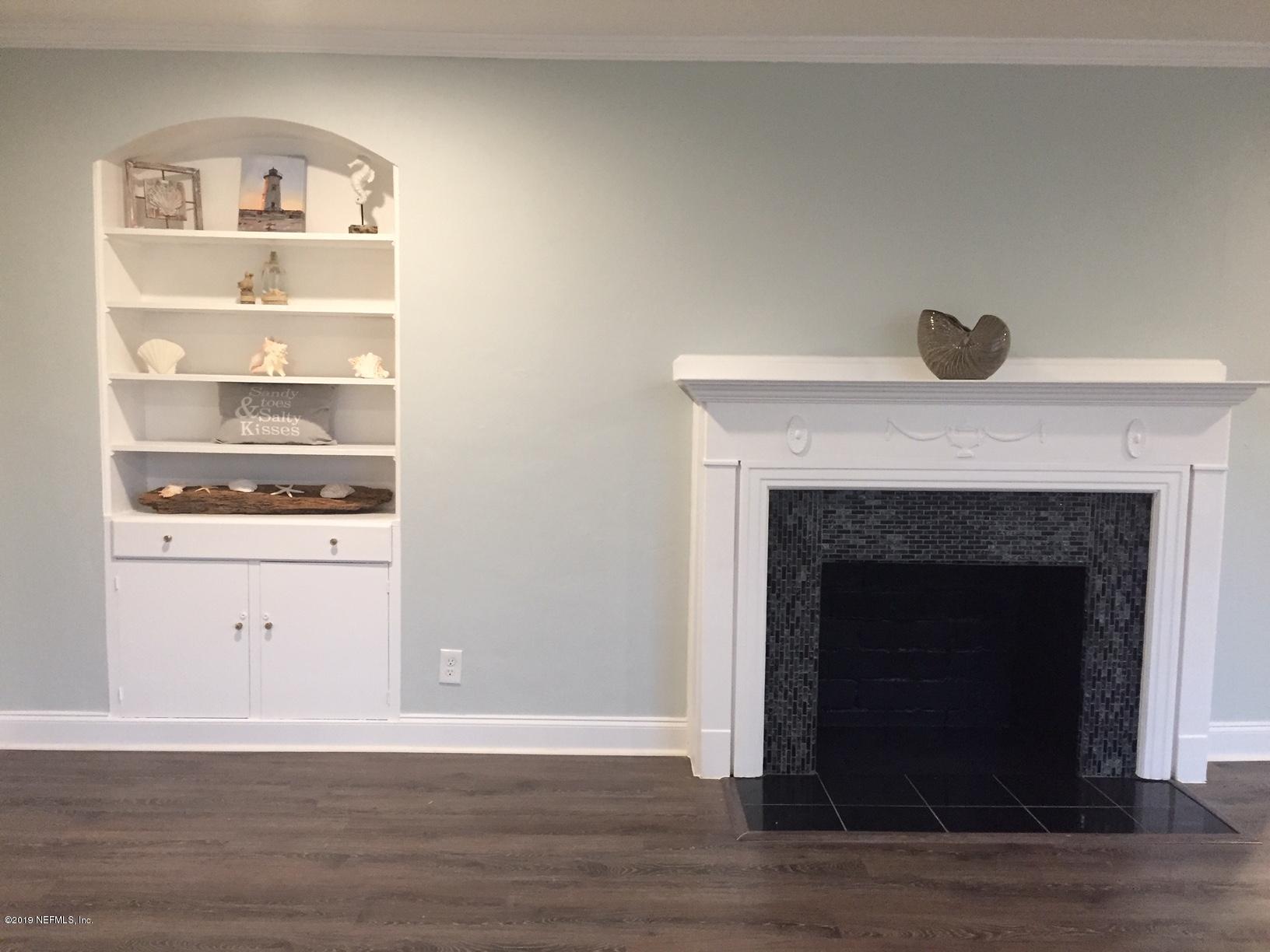 1612 Lorimier Road Jacksonville, FL 32207 - Photo 10 of 47 a view of a livingroom with an empty space and a fireplace