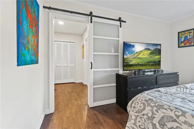 a bathroom with a toilet a sink and a window