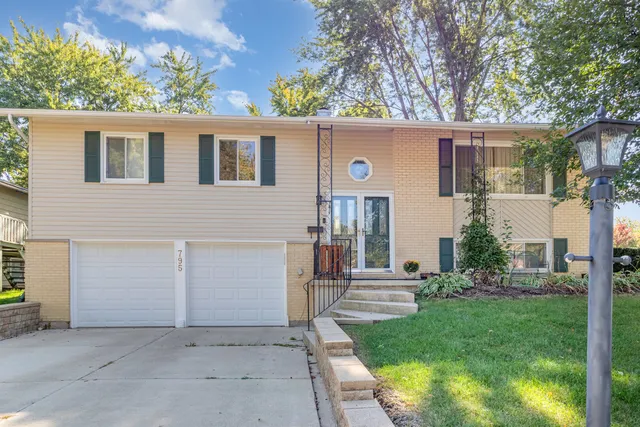 front view of house with a yard