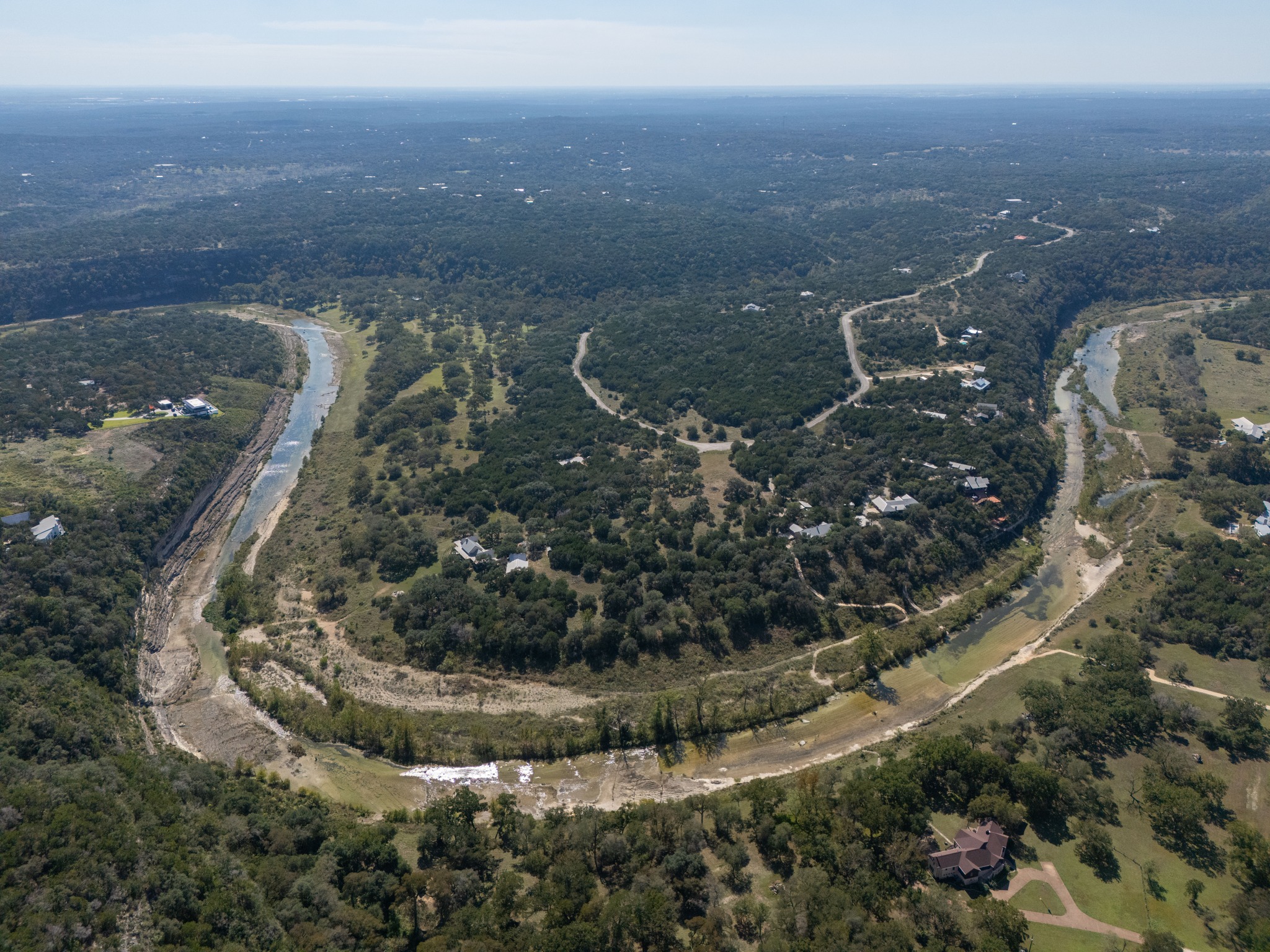 1001 Bluff View Road Wimberley, TX 78676 - Photo 13 of 20 The Blanco River borders the neighborhood.