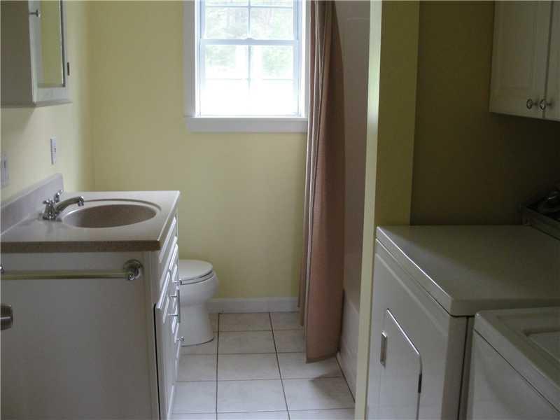 8 Little Pond Road Otisfield, ME 04270 - Photo 17 of 35 Bathroom. The bathroom is tiled and...
