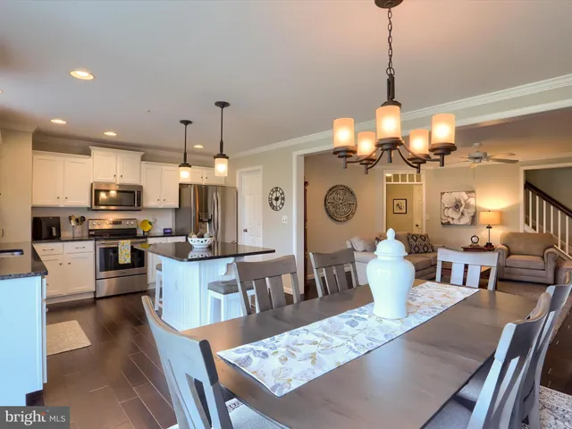 a view of a dining room and livingroom view kitchen