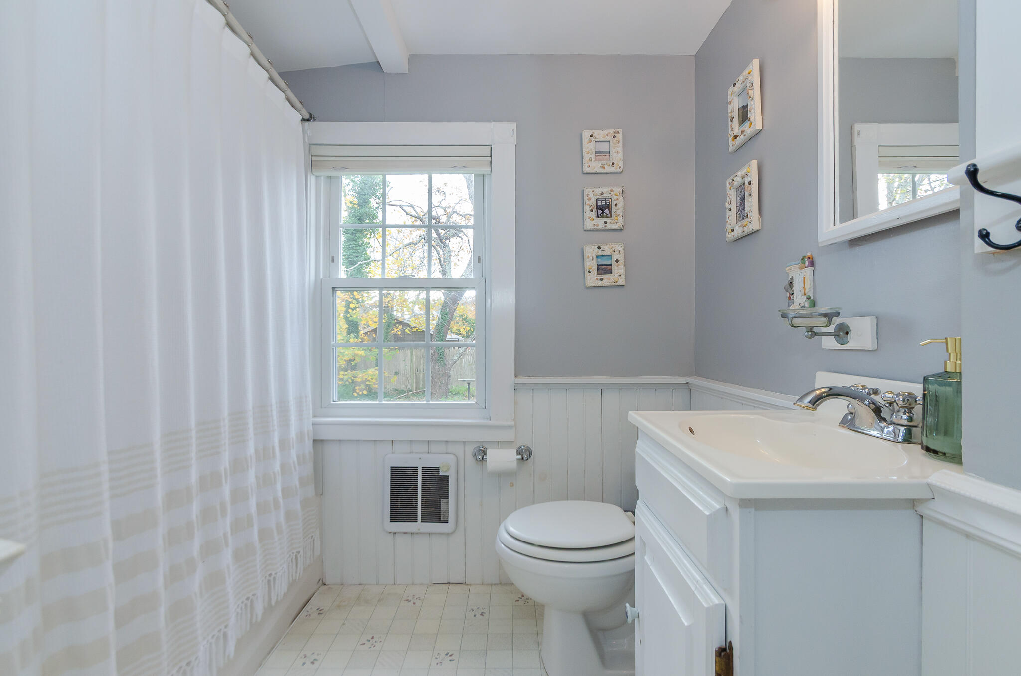 9 Mansion Street West Harwich, MA 02671 - Photo 14 of 26 a bathroom with a sink a toilet and a bathtub