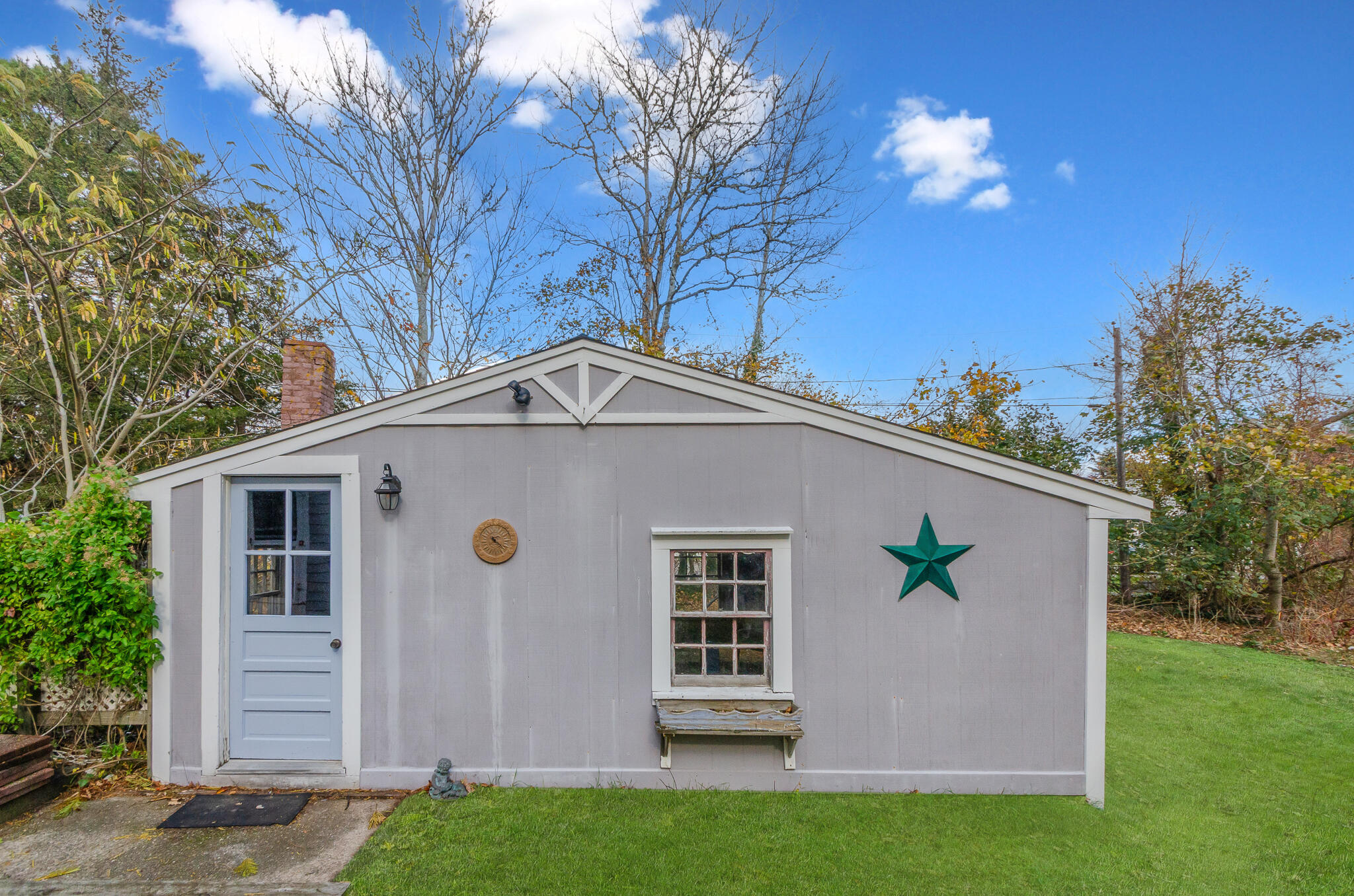 9 Mansion Street West Harwich, MA 02671 - Photo 18 of 26 a view of a house with a yard