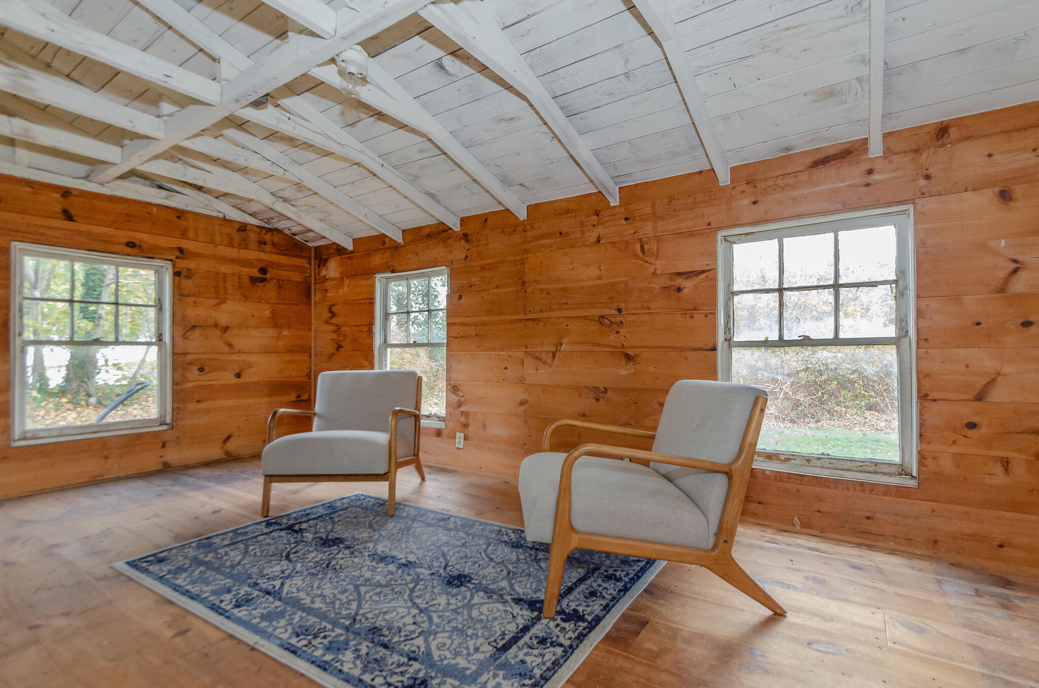 9 Mansion Street West Harwich, MA 02671 - Photo 19 of 26 a living room with furniture and a rug
