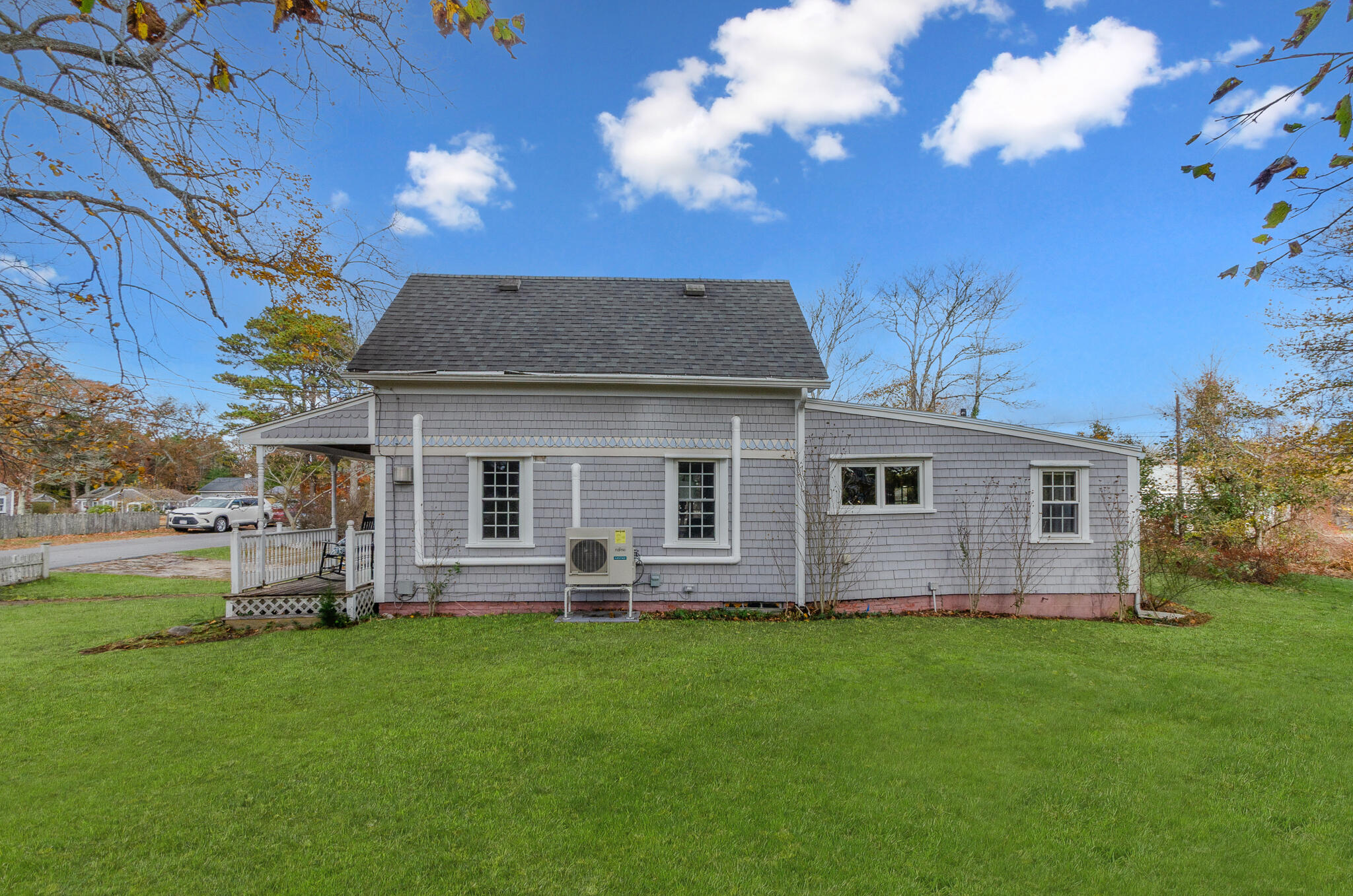 9 Mansion Street West Harwich, MA 02671 - Photo 4 of 26 a view of a house with a yard