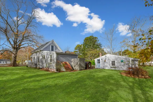 a view of a house with a big yard