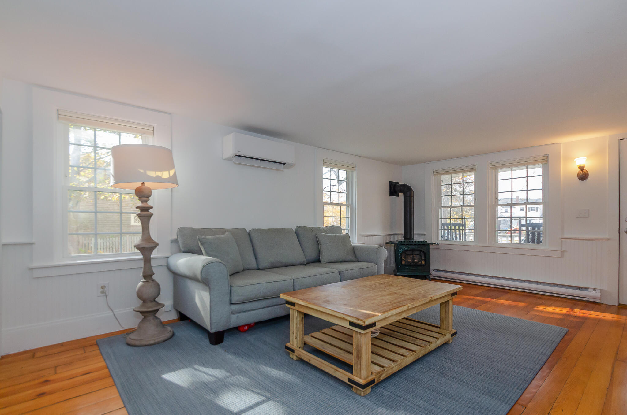 9 Mansion Street West Harwich, MA 02671 - Photo 9 of 26 a living room with furniture rug and window