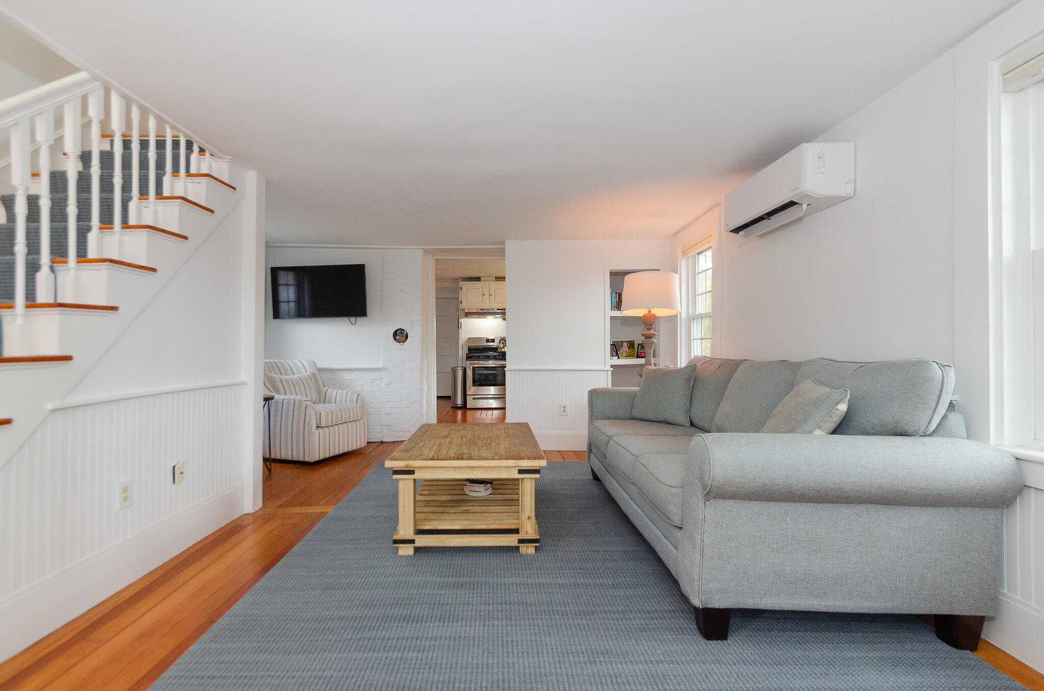 9 Mansion Street West Harwich, MA 02671 - Photo 10 of 26 a living room with furniture and a flat screen tv