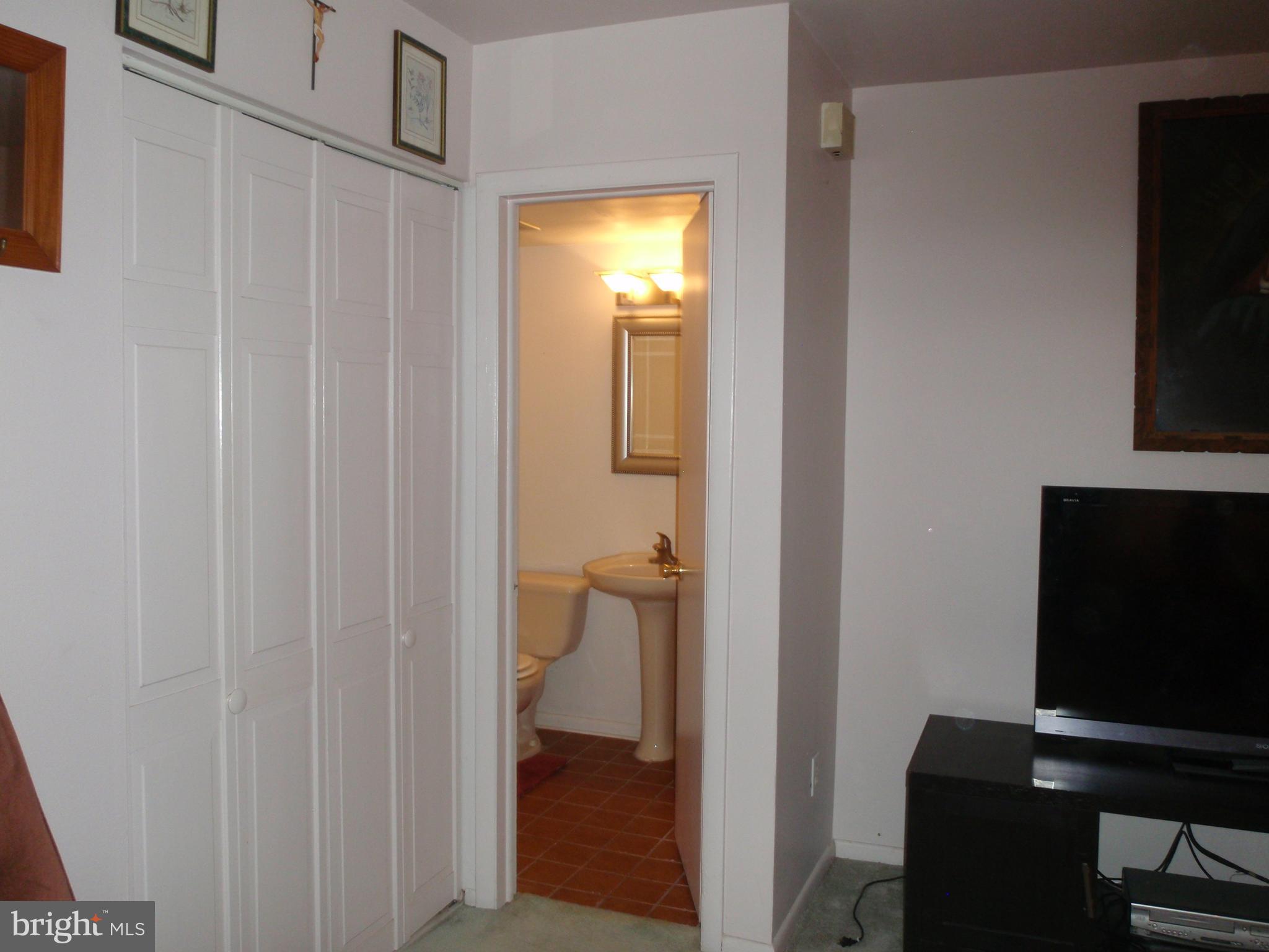 7015 Ridge Avenue, Unit 15 Philadelphia, PA 19128 - Photo 10 of 28 Convenient first floor powder room