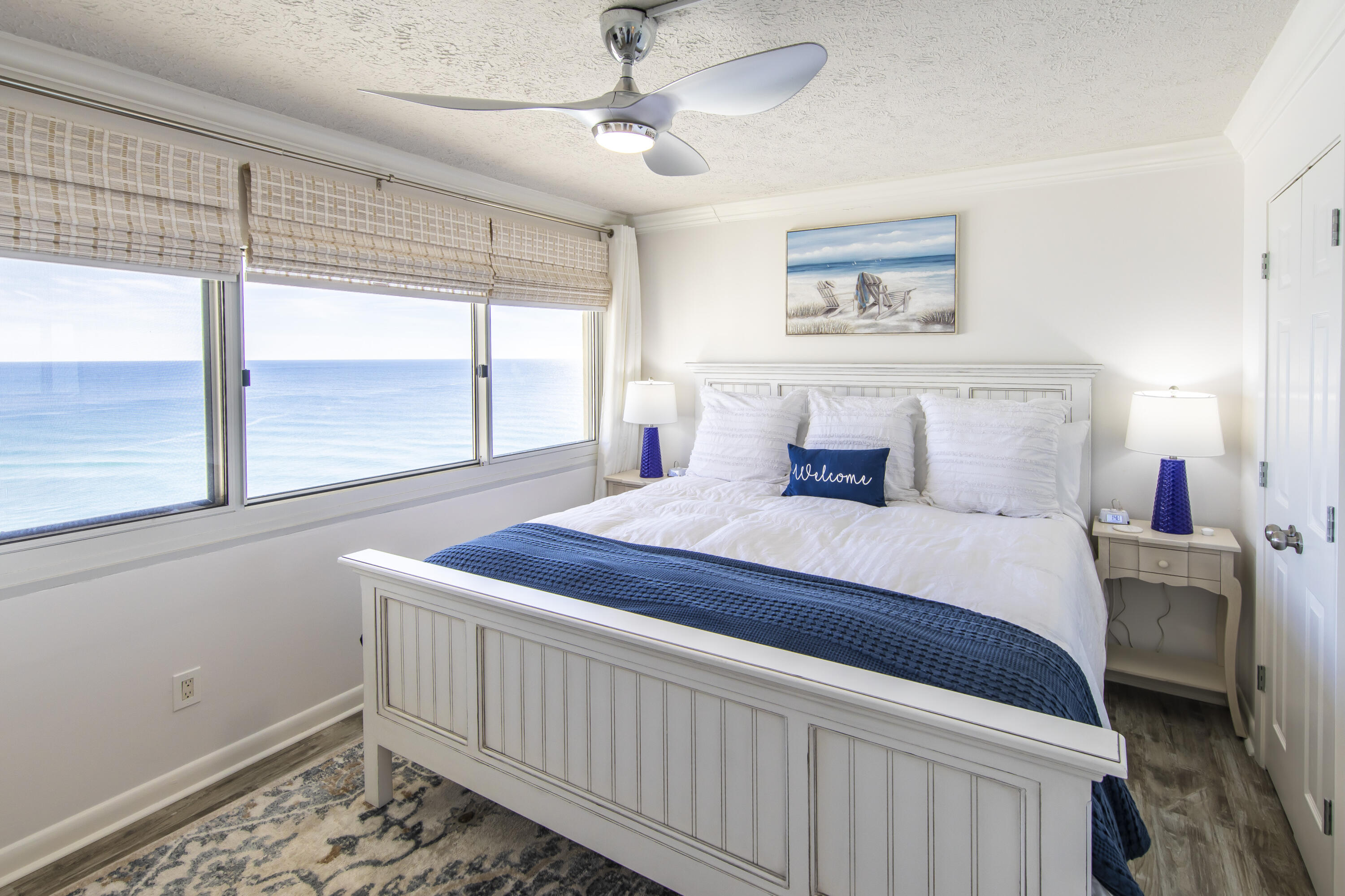 23223 Front Beach Road, Unit A122 Panama City Beach, FL 32413 - Photo 15 of 45 a bedroom with a large bed and a window