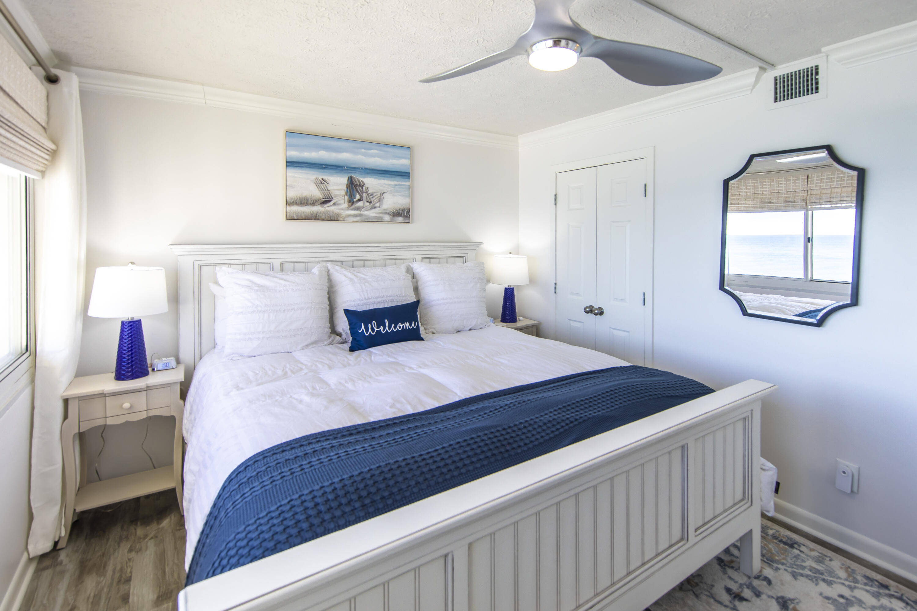 23223 Front Beach Road, Unit A122 Panama City Beach, FL 32413 - Photo 17 of 45 a bedroom with a bed and a window