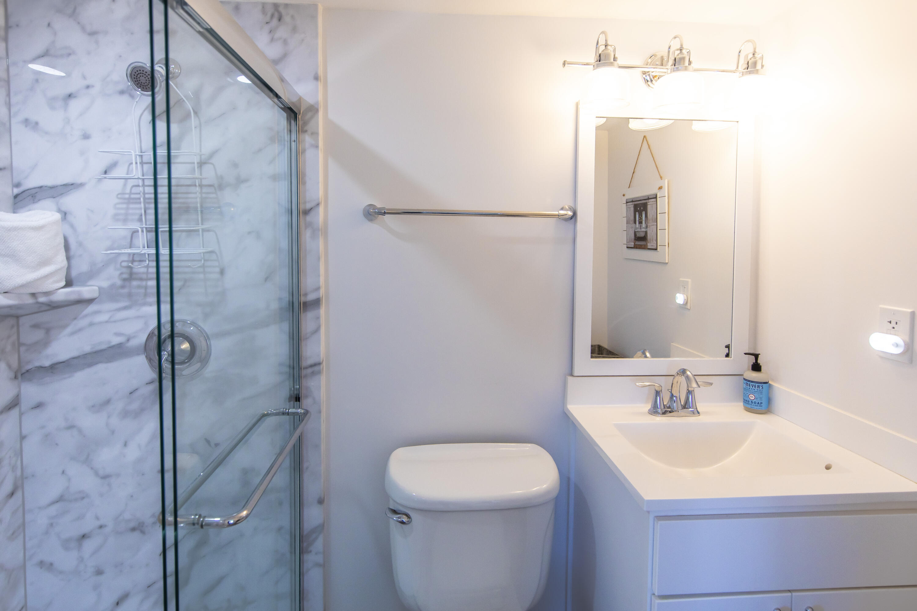 23223 Front Beach Road, Unit A122 Panama City Beach, FL 32413 - Photo 18 of 45 a bathroom with a sink toilet and shower