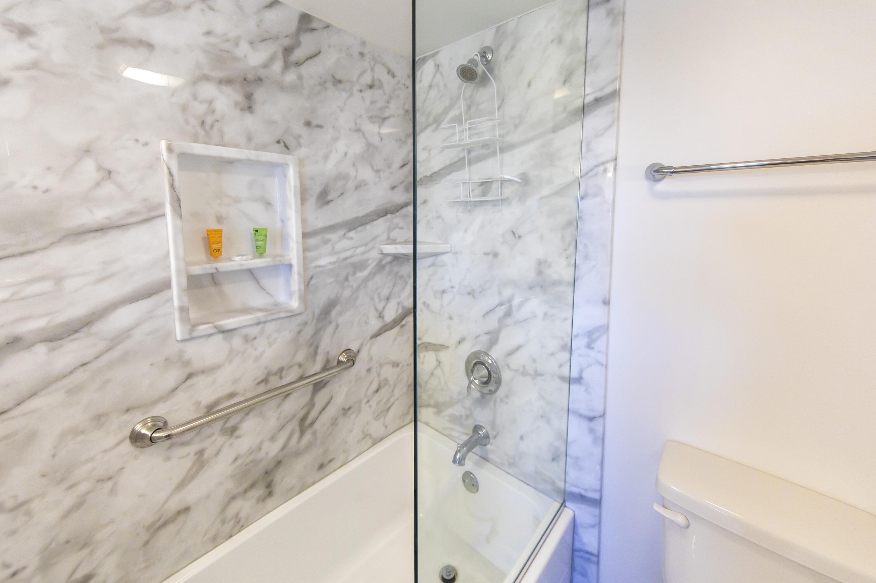 23223 Front Beach Road, Unit A122 Panama City Beach, FL 32413 - Photo 25 of 45 a bathroom with a bathtub and a shower