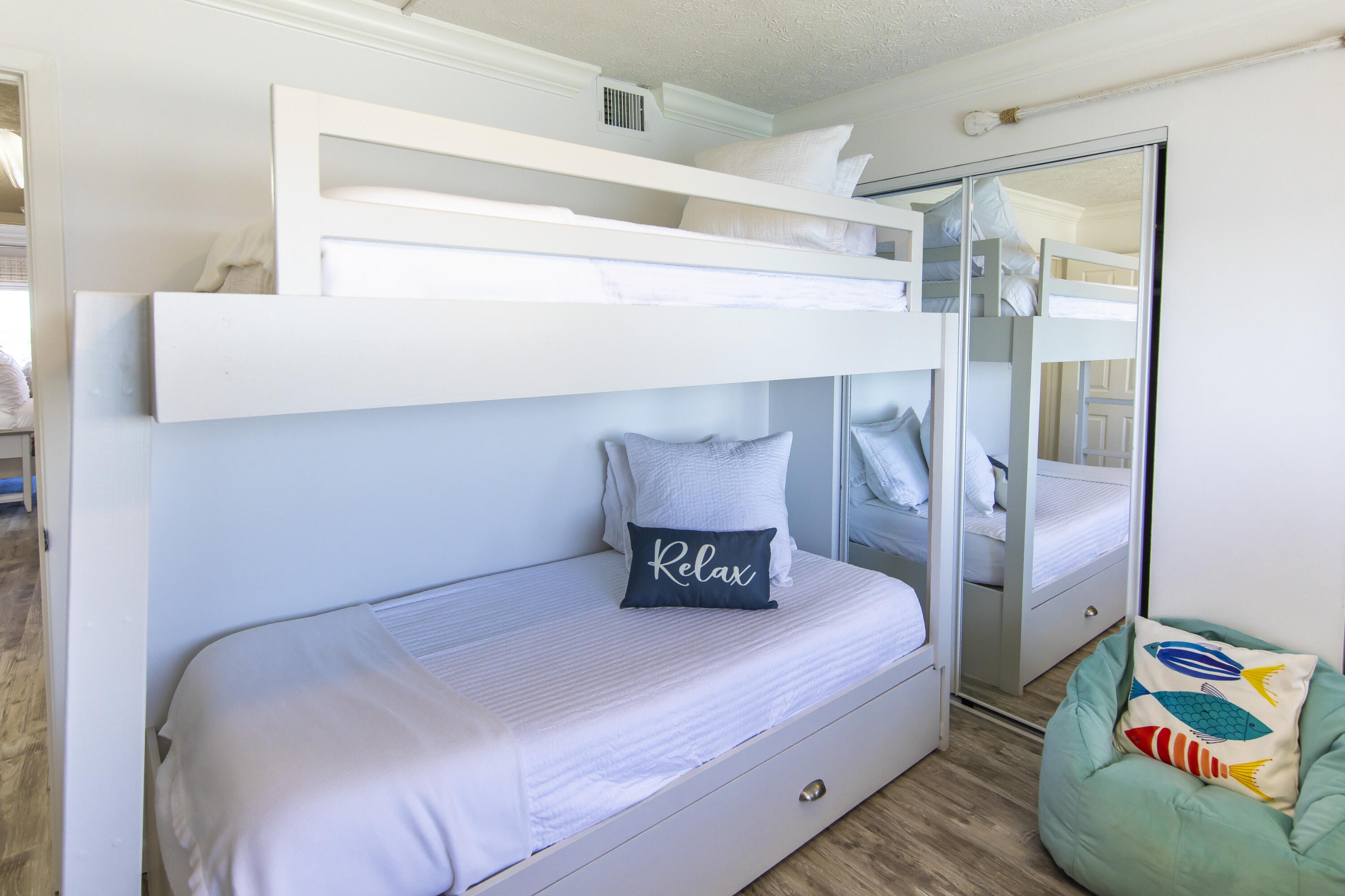 23223 Front Beach Road, Unit A122 Panama City Beach, FL 32413 - Photo 31 of 45 a bedroom with a bed and a window