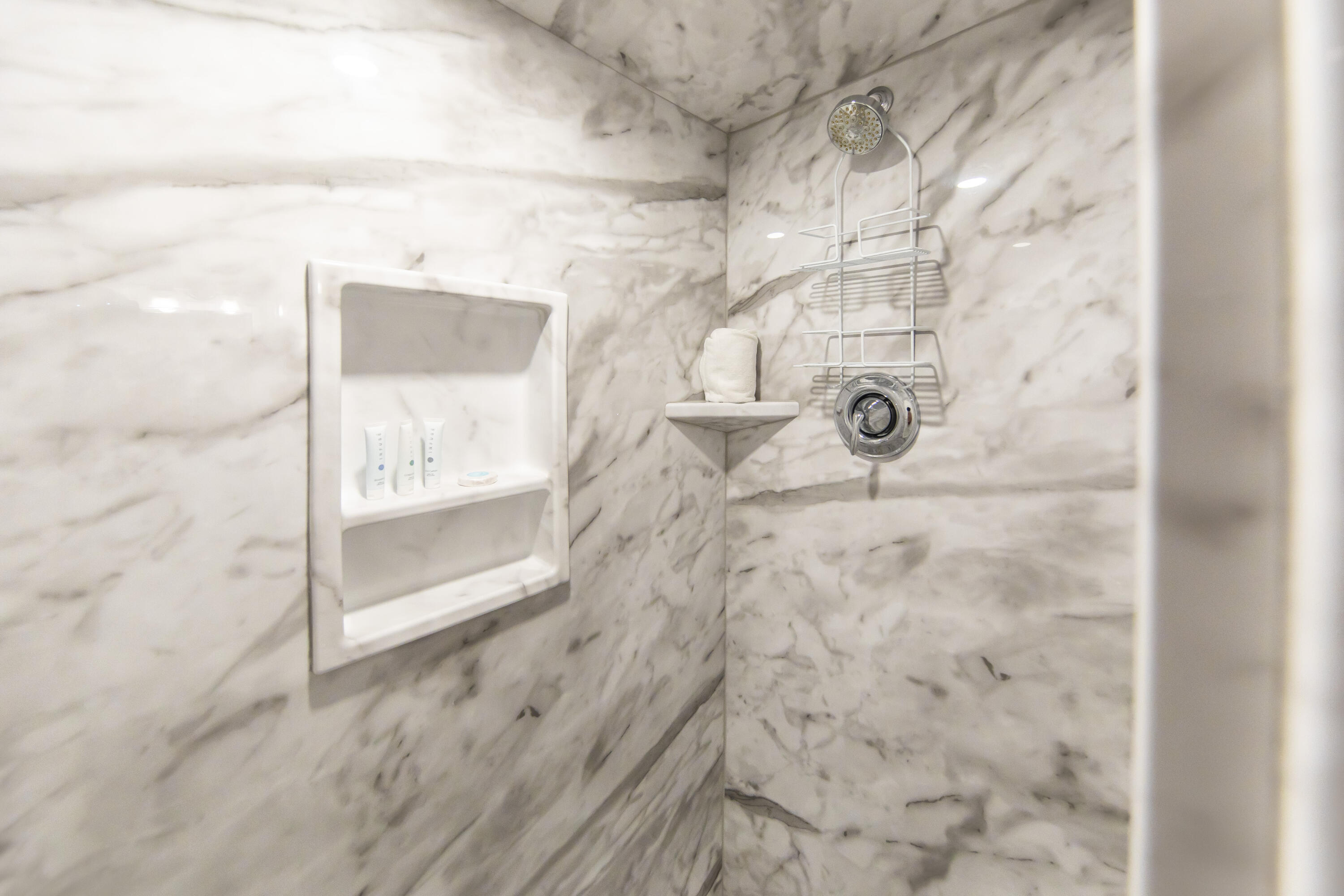 23223 Front Beach Road, Unit A122 Panama City Beach, FL 32413 - Photo 33 of 45 a bathroom with a shower