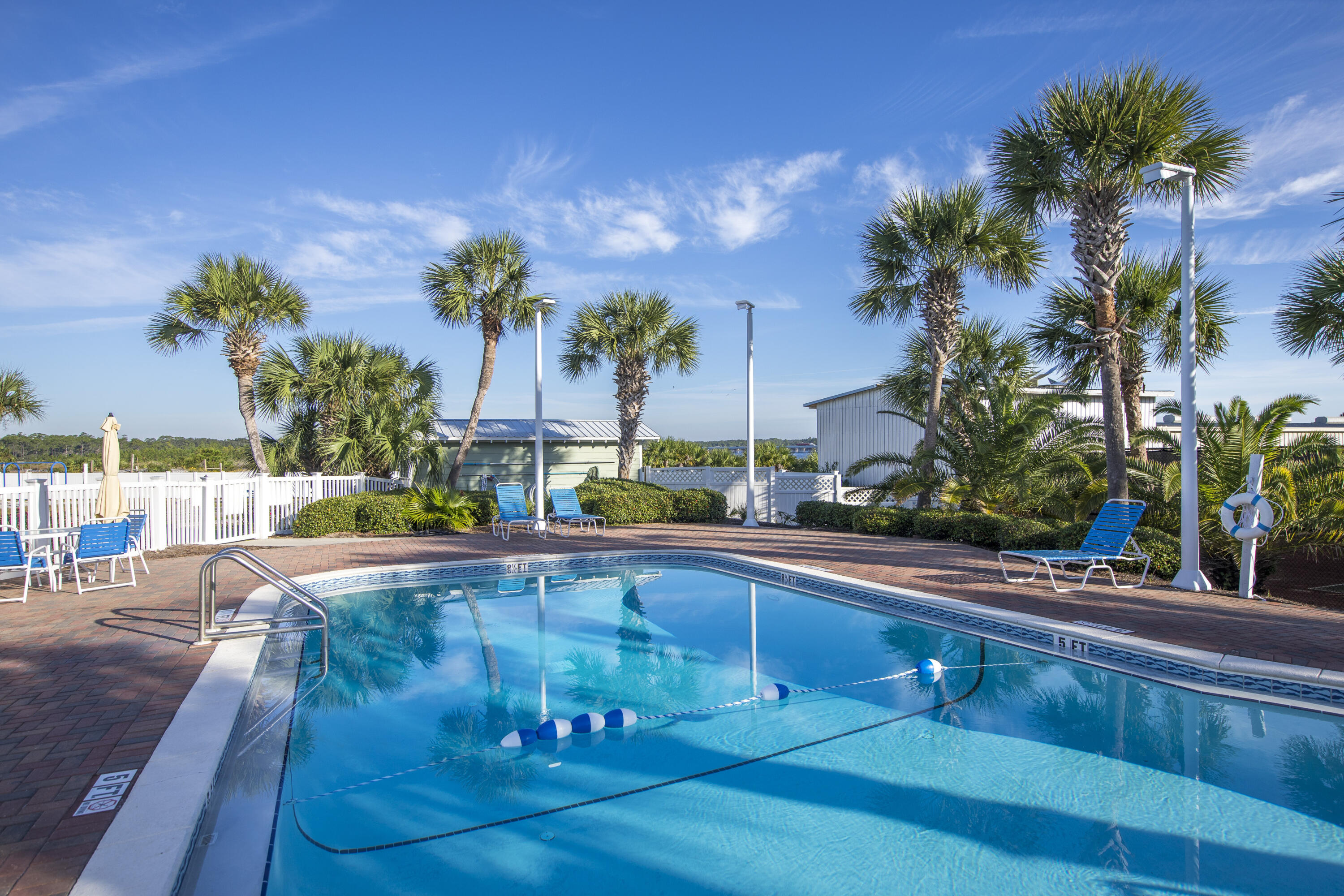 23223 Front Beach Road, Unit A122 Panama City Beach, FL 32413 - Photo 38 of 45 a view of a swimming pool with a patio