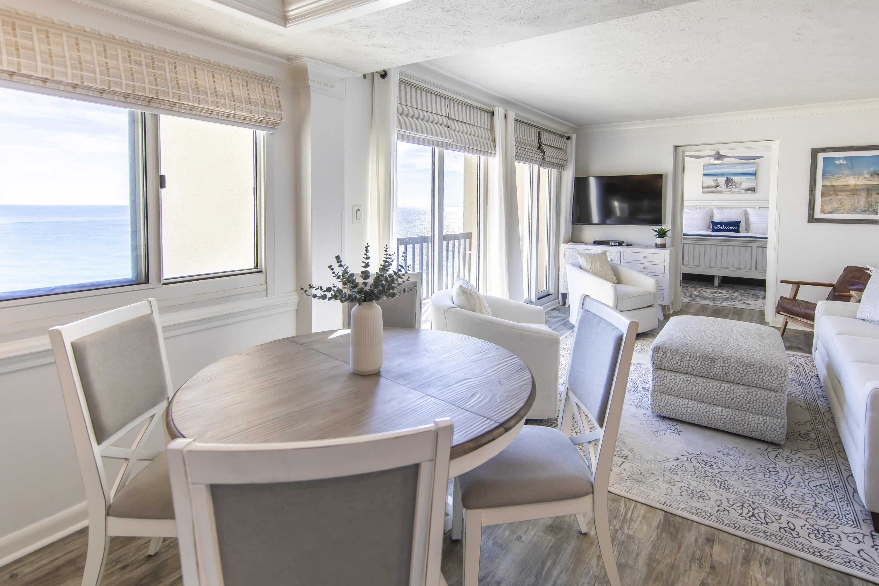 23223 Front Beach Road, Unit A122 Panama City Beach, FL 32413 - Photo 7 of 45 a dining room with furniture and window