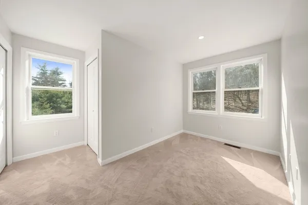 an empty room with windows