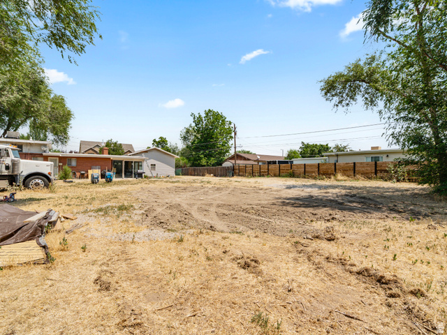 120 Cox Lane Midvale, UT 84047 - Photo 12 of 13 Expansive undeveloped land parcel with partial fencing