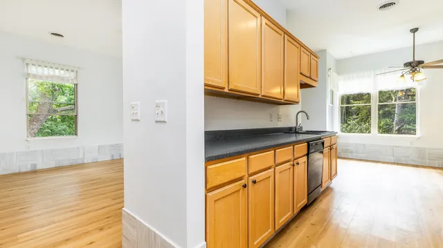 a view of an entryway and kitchen