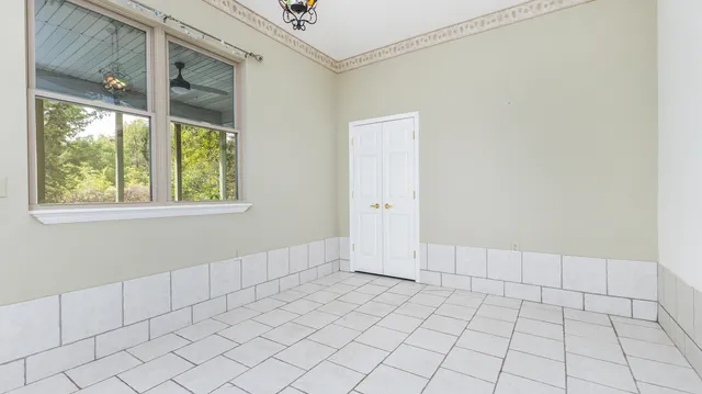 a view of an empty room and window