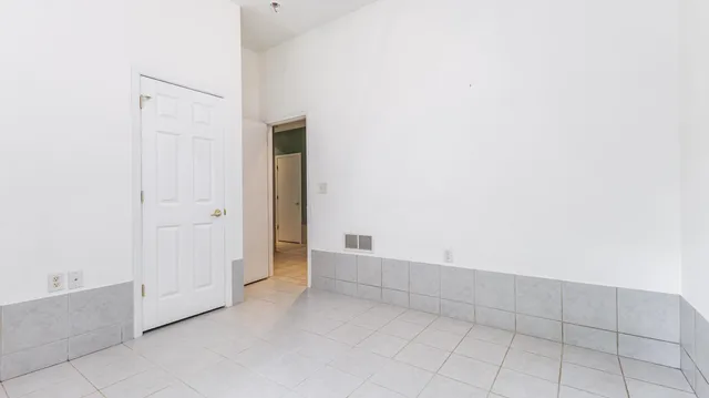 a bathroom with a sink a mirror and a toilet