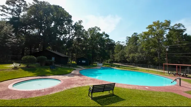 swimming pool view with a outdoor seating