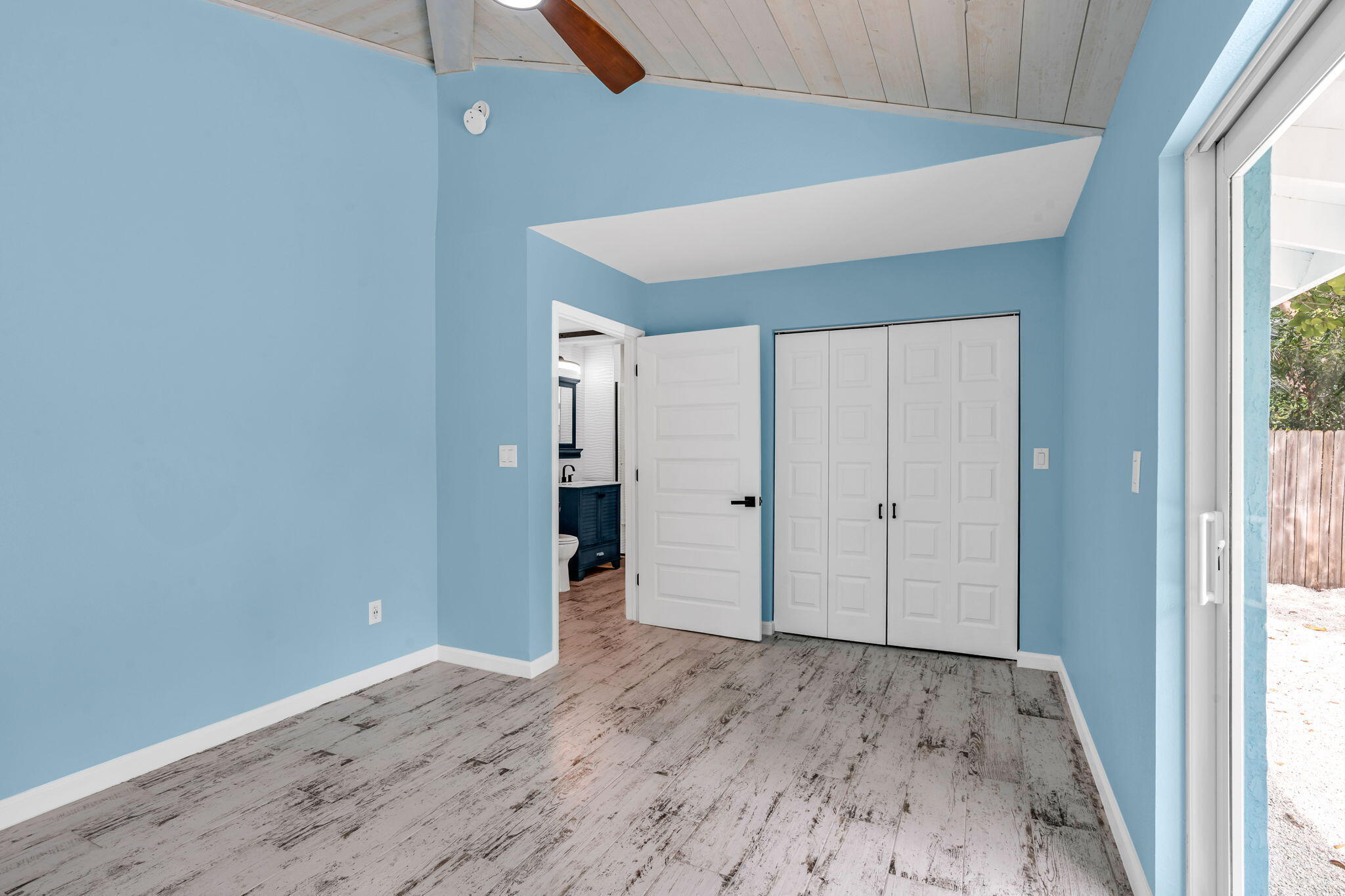 218 Lignumvitae Drive Key Largo, FL 33037 - Photo 14 of 35 a view of a hallway with wooden floor and entryway