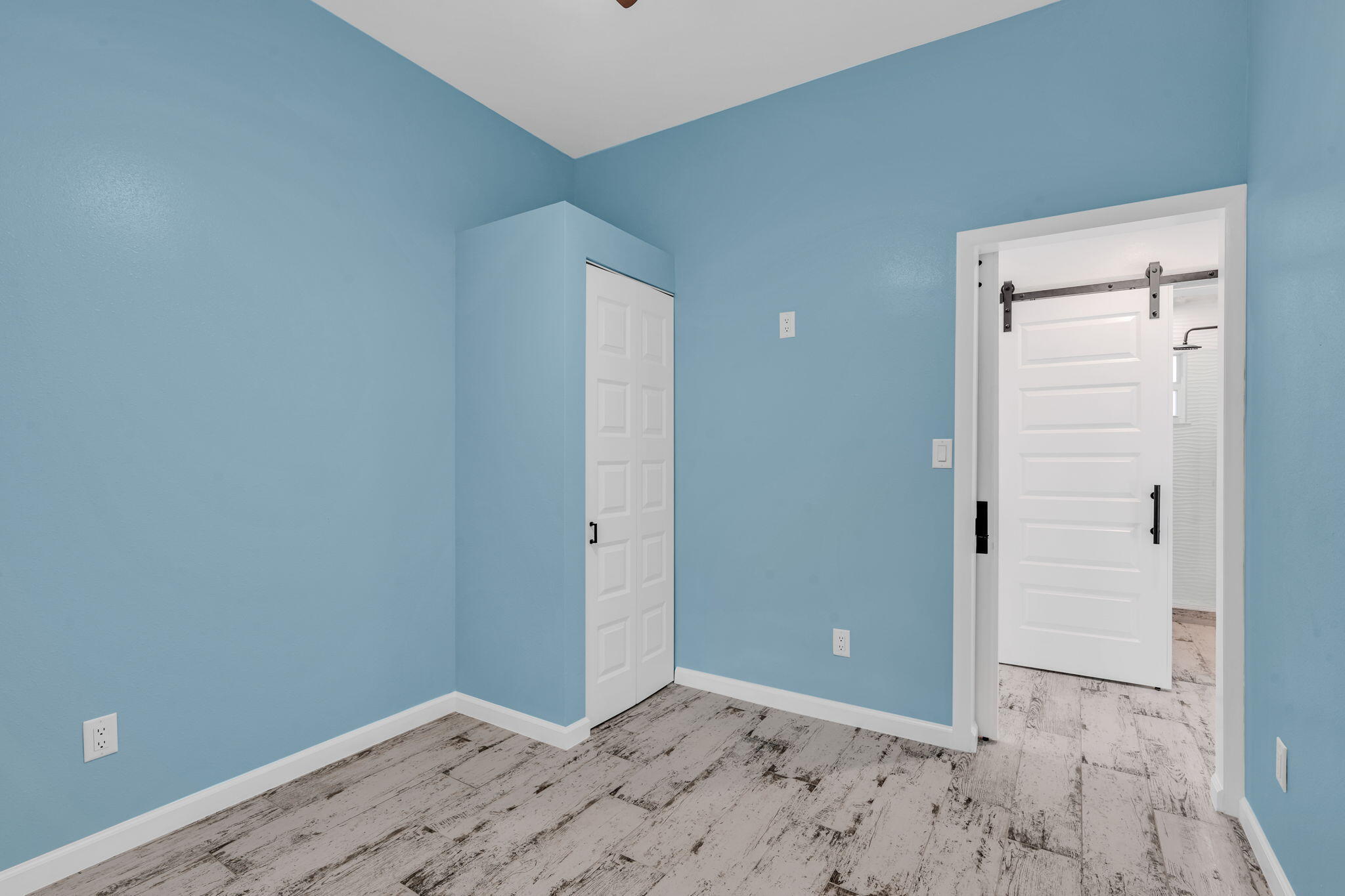 218 Lignumvitae Drive Key Largo, FL 33037 - Photo 22 of 35 wooden floor in an empty room