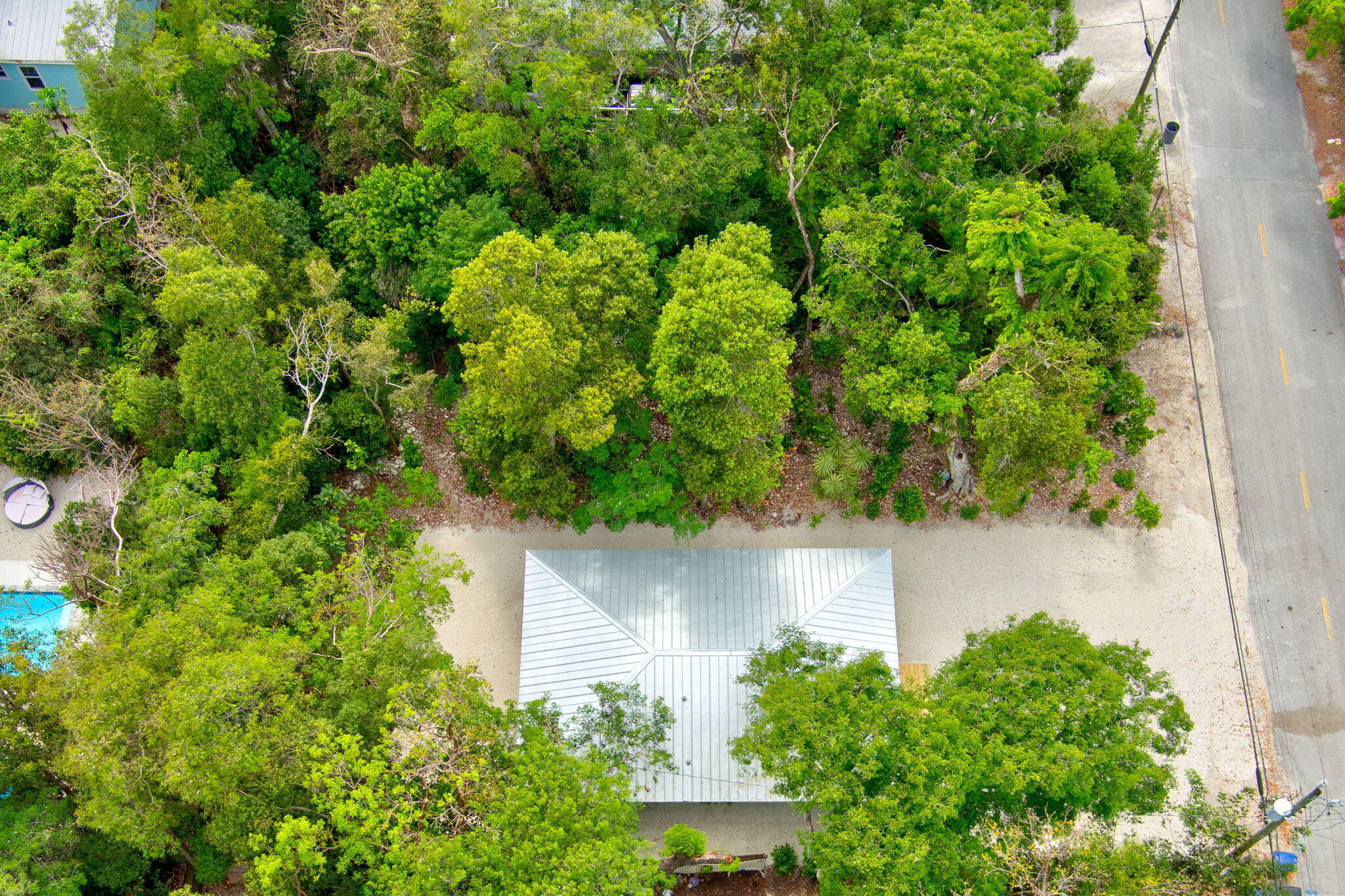 218 Lignumvitae Drive Key Largo, FL 33037 - Photo 29 of 35 an aerial view of a house with a yard