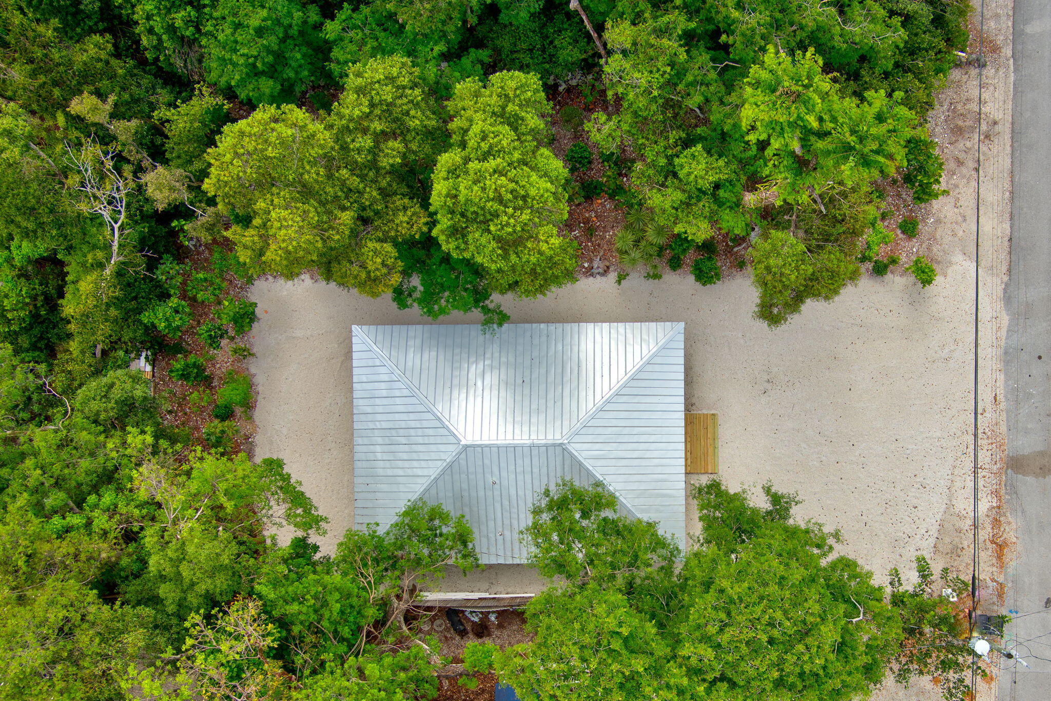 218 Lignumvitae Drive Key Largo, FL 33037 - Photo 30 of 35 an aerial view of a house with a yard and garden