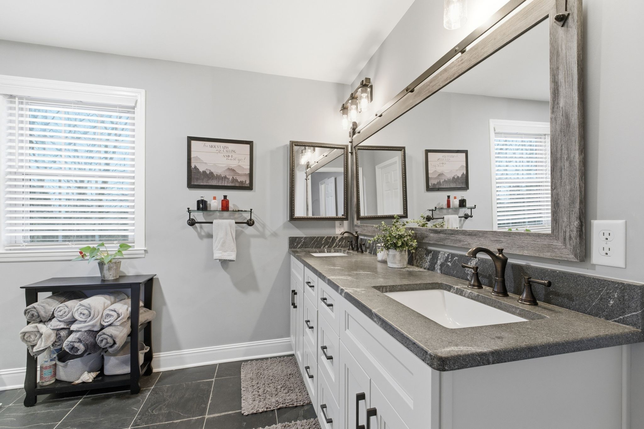 4708 Hessey Road Mount Juliet, TN 37122 - Photo 12 of 44 a bathroom with double vanity sink and a mirror