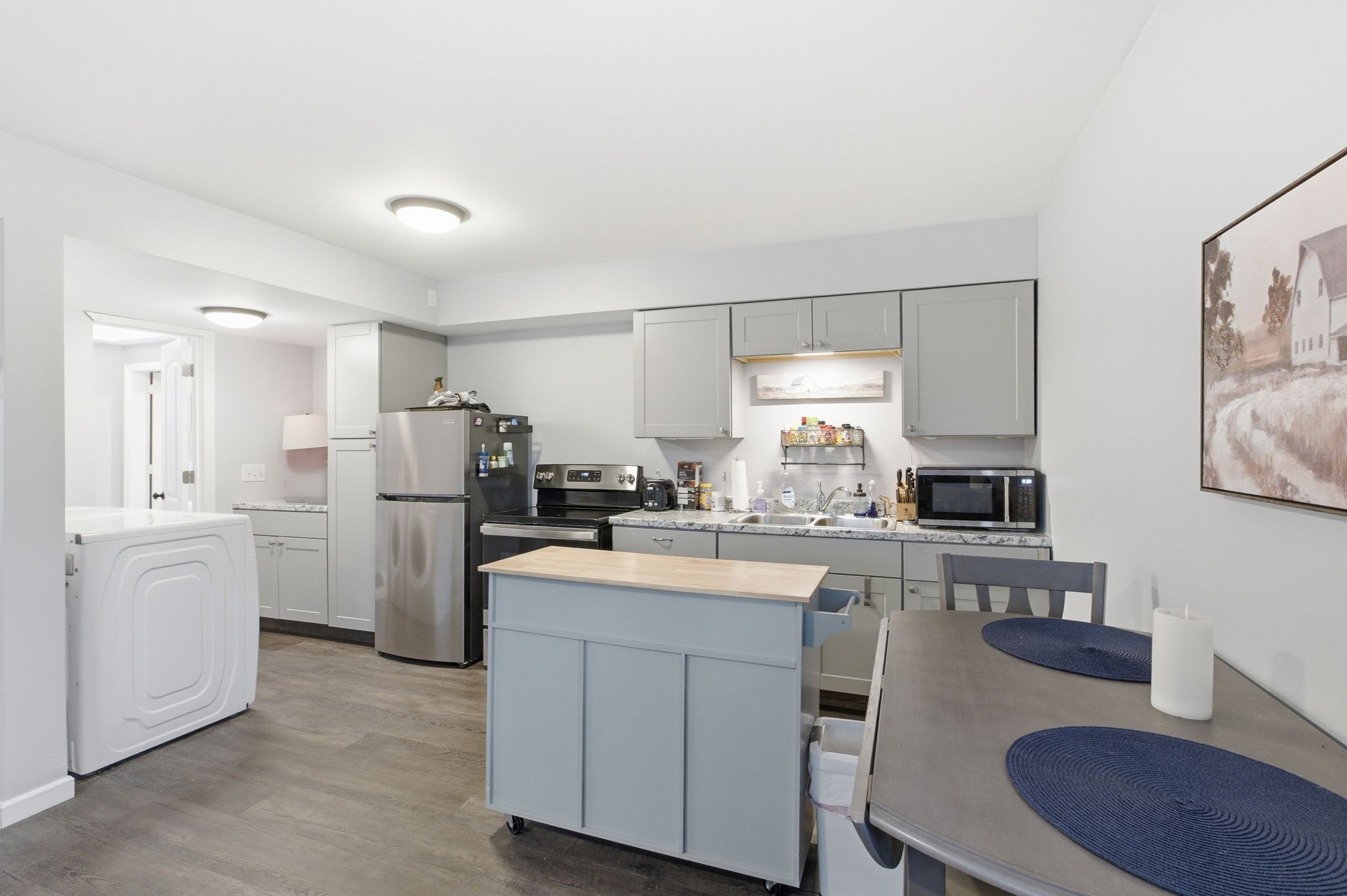 4708 Hessey Road Mount Juliet, TN 37122 - Photo 32 of 44 a kitchen with refrigerator and cabinets