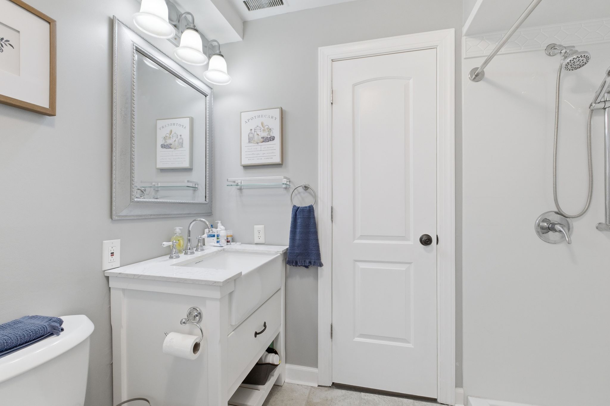 4708 Hessey Road Mount Juliet, TN 37122 - Photo 36 of 44 a bathroom with a sink toilet and shower