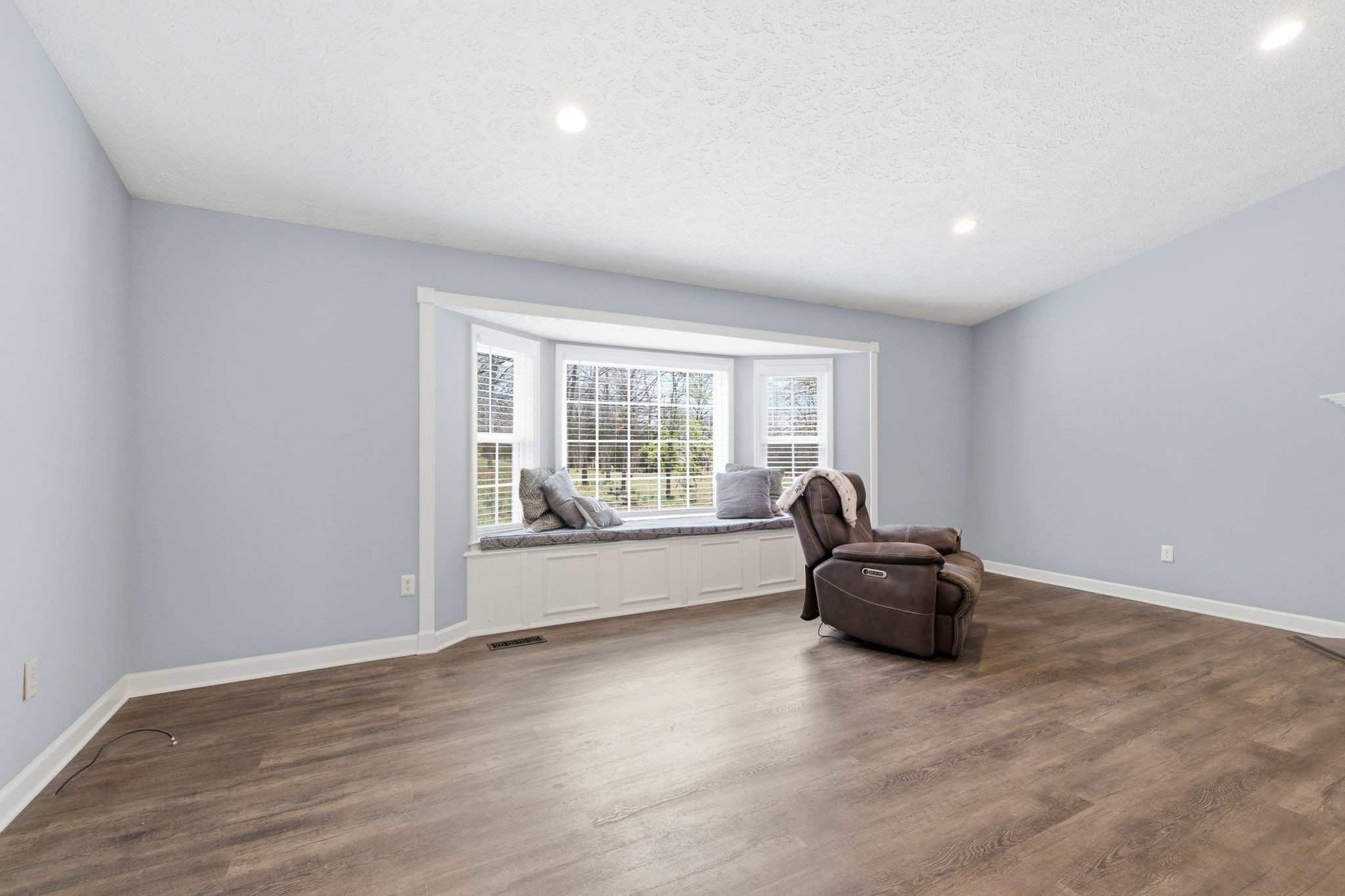 4708 Hessey Road Mount Juliet, TN 37122 - Photo 9 of 44 a view of empty room with wooden floor and fan