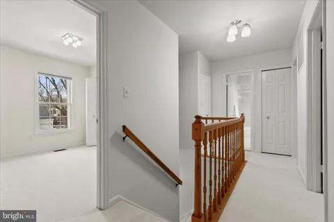 a bathroom with a sink a toilet a tub and shower